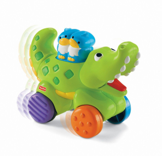 Hračky pre rozvoj lezenia - FISHER Alligator na lezúci kolesách